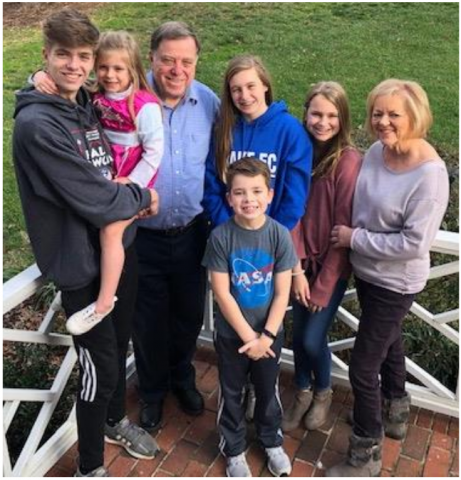 Mark and his wife, Janice, and their five grandchildren
